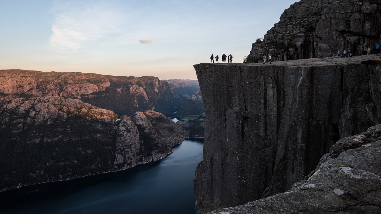 FORSAND, NORWAY - AUGUST 01: Tourists stand on top of Preikestolen ahead of The 'Mission: Impossible - Fallout' Pulpit Rock Norway Screening on August 01, 2018 in Forsand, Norway. (Photo by Jack Taylor/Getty Images for Paramount Pictures)