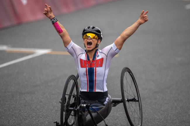 Tokyo 2020 Paralympic Games – Cycling Road 01/09/2021 Tokyo, Japan. Oksana Masters of the United States celebrates after winning at Women's H5 cycling road race at the Tokyo Paralympics on Sept. 1, 2021, at Fuji International Speedway in the Shizuoka Prefecture town of Oyama, central Japan. Oksana was born with several radiation-induced birth defects as a consequence of the radioactivity released by the nuclear accident that occurred in Chernobyl in the north of the Ukrainian SSR in the Soviet Union, her birth country. (Photo by Mauro Ujetto/NurPhoto via Getty Images)