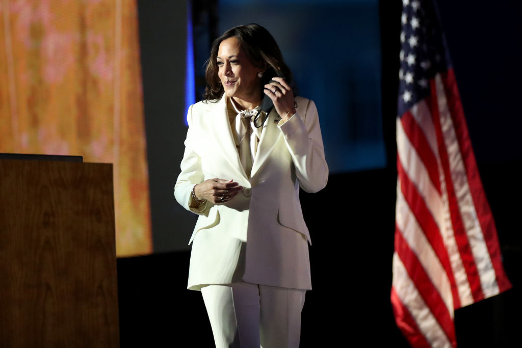 President-Elect Joe Biden And Vice President-Elect Kamala Harris Address The Nation After Election Win WILMINGTON, DELAWARE - NOVEMBER 07: Vice President-elect Kamala Harris speaks on stage at the Chase Center before President-elect Joe Biden's address to the nation November 07, 2020 in Wilmington, Delaware. After four days of counting the high volume of mail-in ballots in key battleground states due to the coronavirus pandemic, the race was called for Biden after a contentious election battle against incumbent Republican President Donald Trump. (Photo by Drew Angerer/Getty Images)