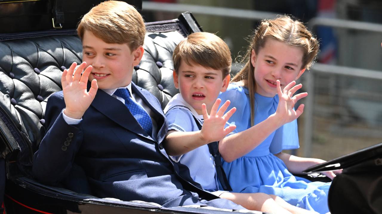 LONDON, ENGLAND - JUNE 02: Prince George, Prince Louis and Princess Charlotte in the carriage procession at Trooping the Colour during Queen Elizabeth II Platinum Jubilee on June 02, 2022 in London, England. The Platinum Jubilee of Elizabeth II is being celebrated from June 2 to June 5, 2022, in the UK and Commonwealth to mark the 70th anniversary of the accession of Queen Elizabeth II on 6 February 1952. Trooping The Colour, also known as The Queen's Birthday Parade, is a military ceremony performed by regiments of the British Army that has taken place since the mid-17th century. It marks the official birthday of the British Sovereign. This year, from June 2 to June 5, 2022, there is the added celebration of the Platinum Jubilee of Elizabeth II in the UK and Commonwealth to mark the 70th anniversary of her accession to the throne on 6 February 1952. (Photo by /WireImage)