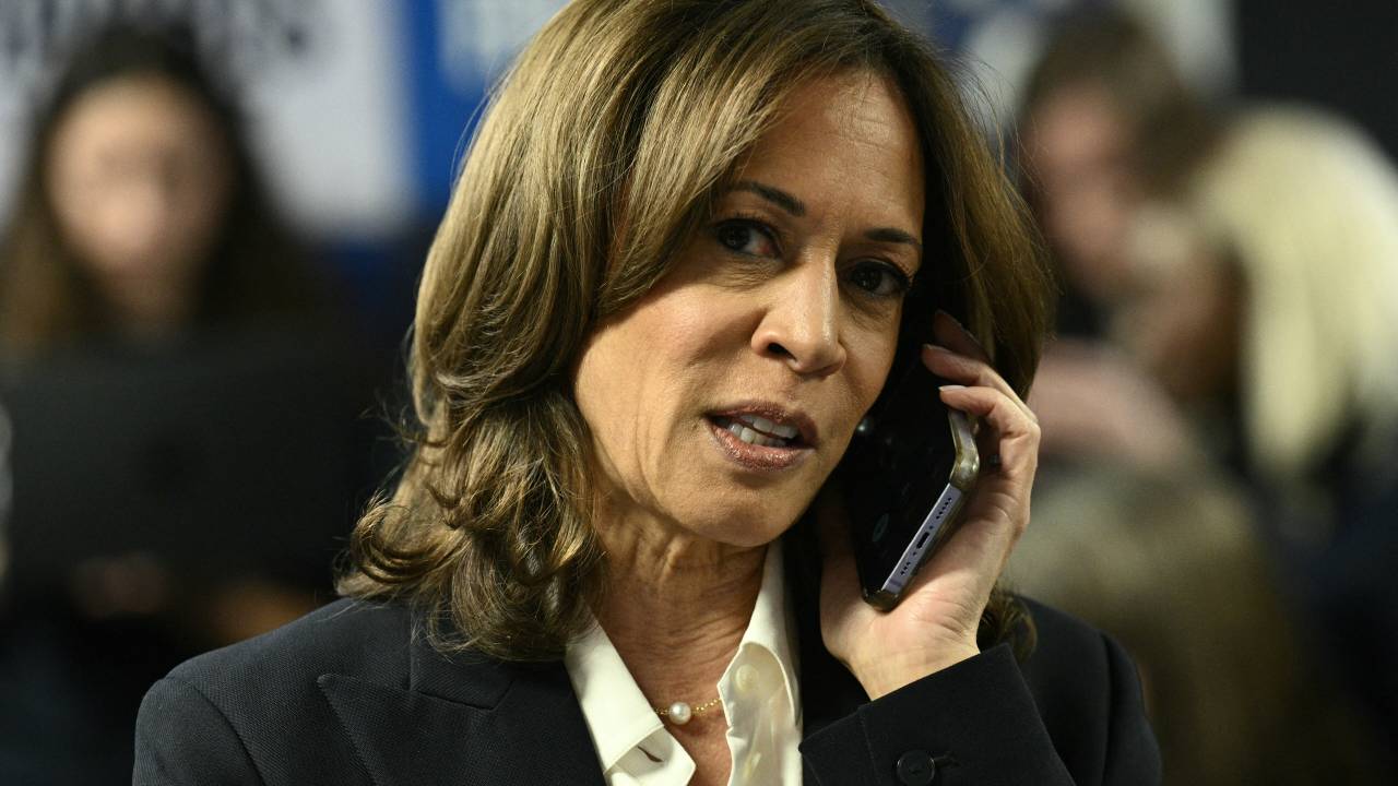 US Vice President and Democratic presidential candidate Kamala Harris takes part in a phone bank at the Democratic National Committee headquarters in Washington, DC, on November 5, 2024 (Photo by Brendan SMIALOWSKI / AFP)