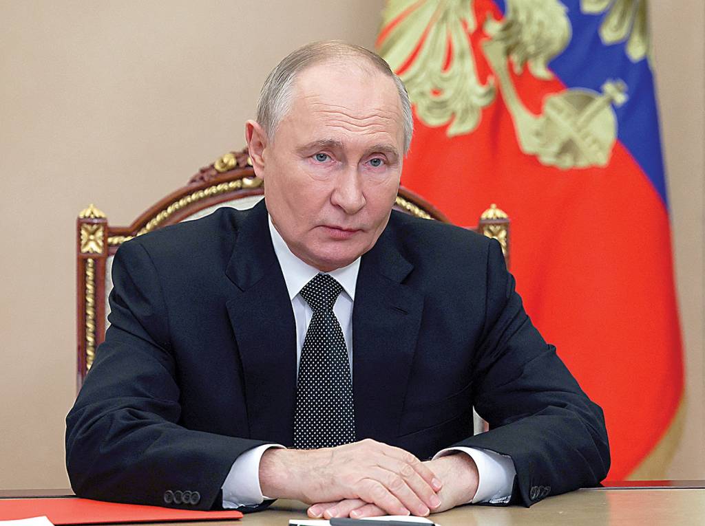 000_36LR3VN AUSENTE - Putin: com mandado de prisão nas costas, ele preferiu não aparecer