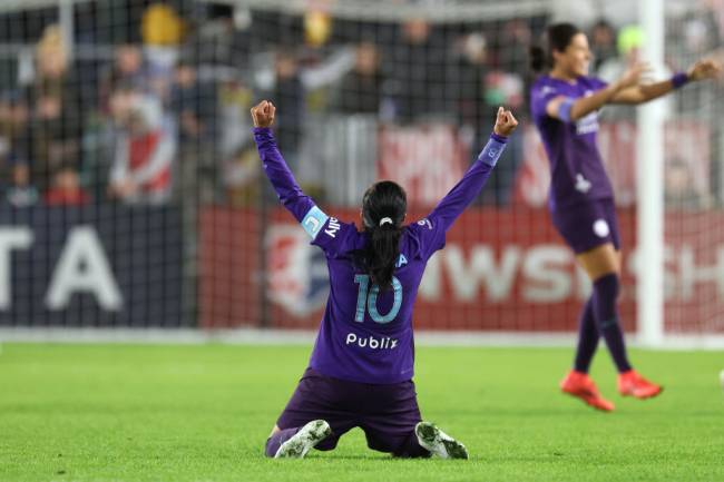 KANSAS CITY, MISSOURI - NOVEMBER 23: Marta #10 of the Orlando Pride celebrates after defeating the Washington Spirit 1-0 in the NWSL 2024 Championship Game at CPKC Stadium on November 23, 2024 in Kansas City, Missouri. (Photo by Jamie Squire/Getty Images)