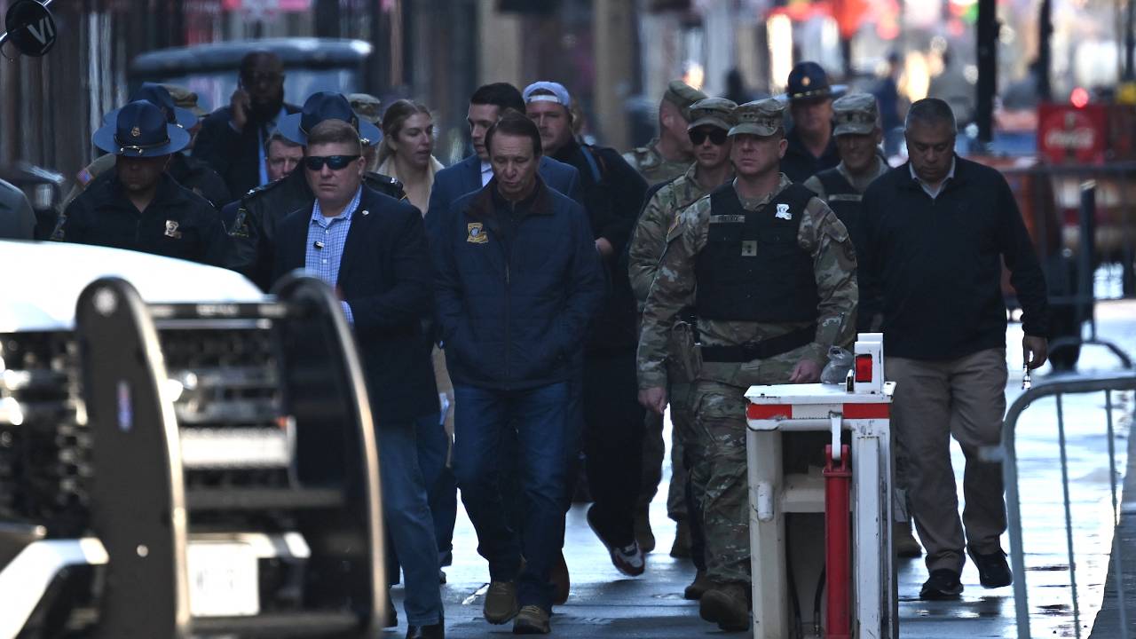 Louisiana Governor Jeff Landry (C) inspects Bourbon Street in the the French Quarter on January 2, 2025 in New Orleans, Louisiana, following a terrorist attack on January 1. At least 15 people were killed and 30 injured on January 1 when a vehicle plowed overnight into a New Year's crowd in the heart of the thriving New Orleans tourist district, authorities in the southern US city said. (Photo by ANDREW CABALLERO-REYNOLDS / AFP)