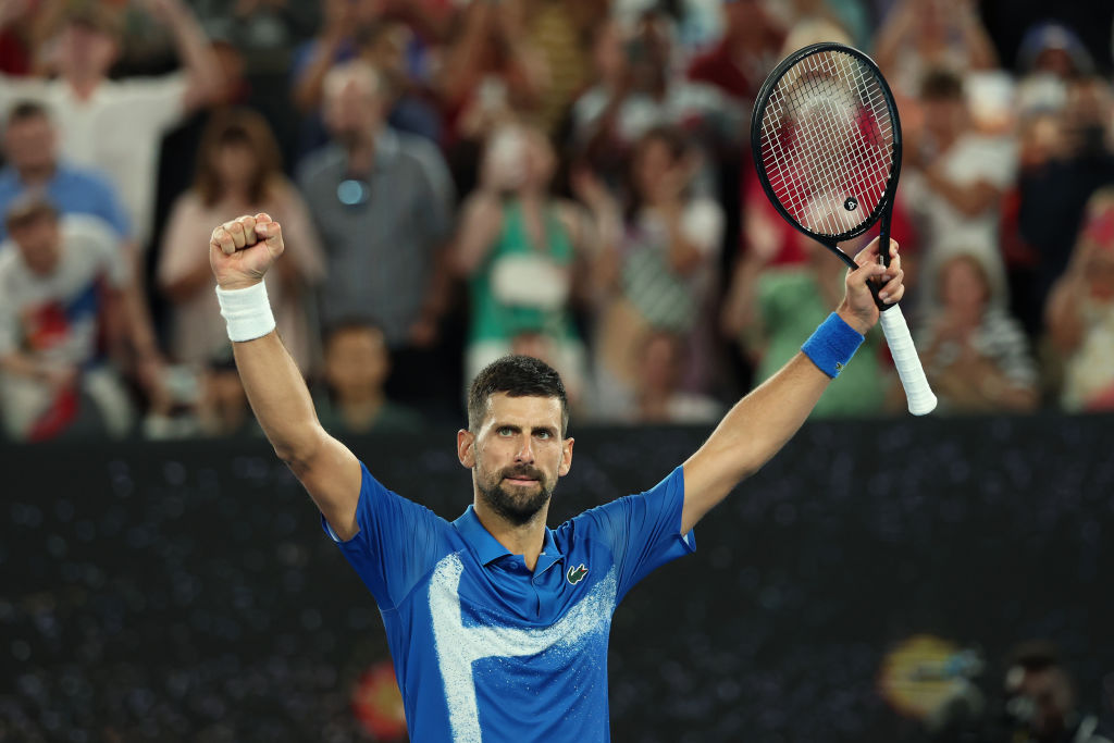 MELBOURNE, AUSTRALIA - JANUARY 21: Novak Djokovic of Serbia celebrates victory against Carlos Alcaraz of Spain in the Men's Singles Quarterfinal match during day 10 of the 2025 Australian Open at Melbourne Park on January 21, 2025 in Melbourne, Australia. (Photo by Clive Brunskill/Getty Images)