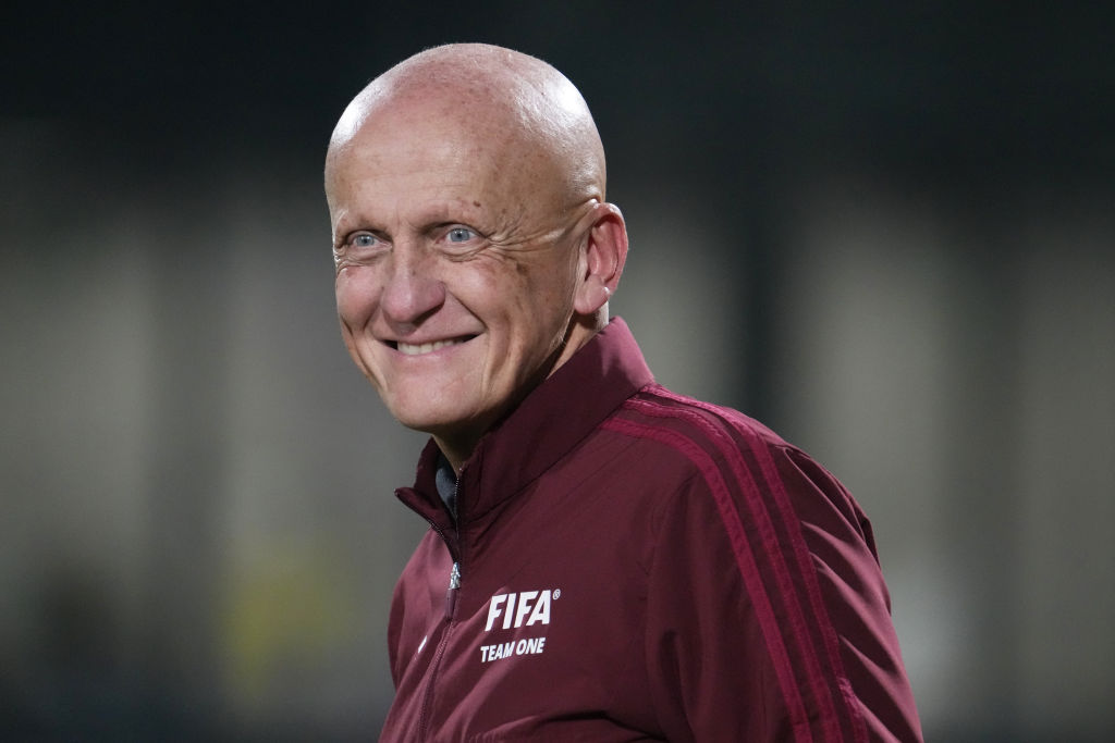 JEDDAH, SAUDI ARABIA - DECEMBER 21: Pierluigi Collina smiles after the FIFA Legends match between Saudi Legends and World Legends at Al-Ahli Sports Club on December 21, 2023 in Jeddah, Saudi Arabia. (Photo by Etsuo Hara/Getty Images)