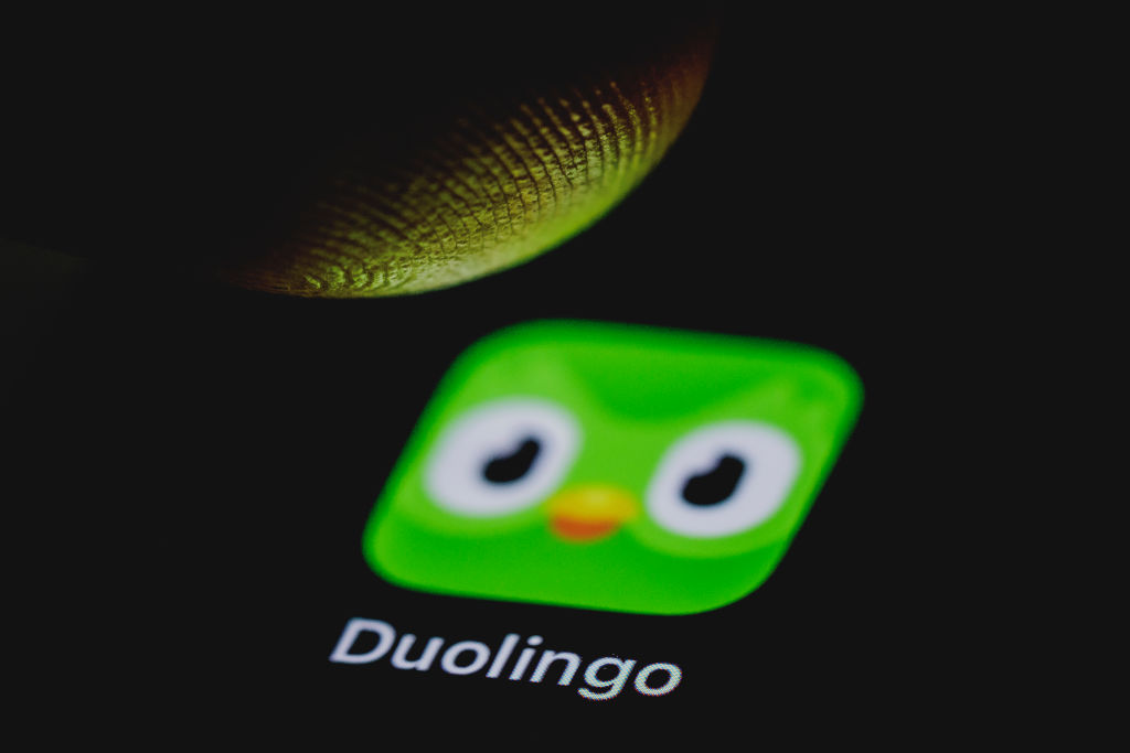 BERLIN, GERMANY - AUGUST 22: In this photo illustration the icon of the learning app Duolingo is pictured on a smartphone display on August 22, 2024 in Berlin, Germany. (Photo Illustration by Florian Gaertner/Getty Images)