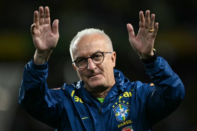 FILES-FBL-WC-2026-BRAZIL-DORIVAL-DISMISSAL (FILES) Brazil's head coach Dorival Junior acknowledges the crowd during the 2026 FIFA World Cup South American qualifiers football match between Brazil and Ecuador, at the Major Antônio Couto Pereira stadium in Curitiba, Brazil, on September 6, 2024. The Brazilian Football Confederation (CBF) announced on March 28, 2025 the dismissal of coach Dorival Junior after the Seleçao suffered a historic 4-1 drubbing by Argentina on the last day of the world Cup South American qualifiers. The five-time champions conceded four goals for the first time in a pre-World Cup match, a blow that sealed the fate of the 62-year-old coach, who had taken over in January 2024. (Photo by Mauro PIMENTEL / AFP)