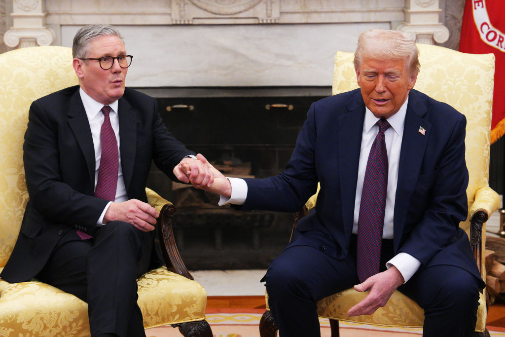 WASHINGTON, DC - FEBRUARY 27: (L-R) UK Prime Minister Sir Keir Starmer meets with U.S. President Donald Trump, during a bilateral meeting in the Oval Office at the White House on February 27, 2025 in Washington, DC. British Prime Minister Keir Starmer is on his first visit to Washington since US President Donald Trump returned to the White House. Starmer's trip comes shortly after he announced an increase in UK defence spending, ostensibly as a signal to Trump that the UK is prepared to bolster Europe's security, and as he aims to broker a fair peace deal for Ukraine amid Trump's warming relations with Russia. (Photo by Carl Court - Pool/Getty Images)