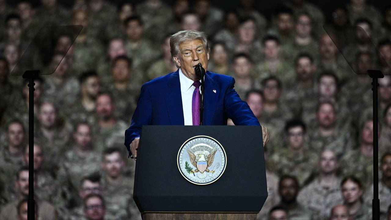 US President Donald Trump addresses troops at the Al-Udeid air base southwest of Doha on May 15, 2025. (Photo by Brendan SMIALOWSKI / AFP)