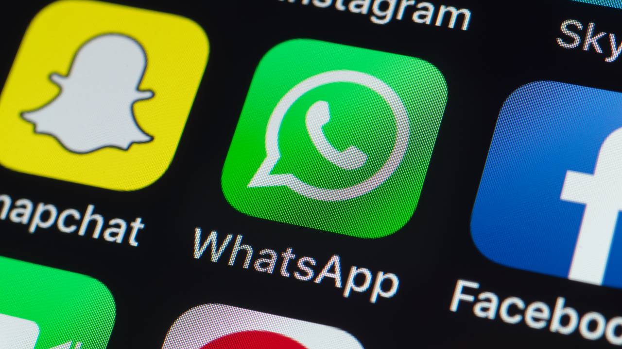 London, UK - July 19, 2018: The buttons of Instagram, Skype, Snapchat, Facebook, WhatsApp, Pinterest and other apps on the screen of an iPhone.