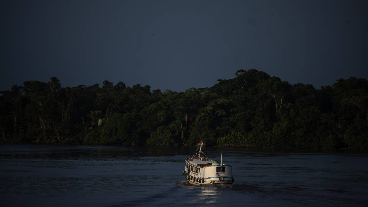 A ferry on a tributary of the Amazon River near Breves, Para state, Brazil, on Wednesday, Sept. 21, 2022. In the heart of the Amazon, rust-colored bauxite is being clawed from a mine that has long faced allegations of pollution and land appropriation, then moved to a coastal Brazilian refinery accused of sickening thousands of people, and ultimately traced to aluminum used in Ford's F-150 Lightning. Photographer: Jonne Roriz/Bloomberg via Getty Images