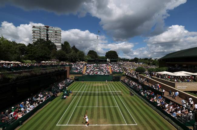 LONDON, ENGLAND - JULY 07: A general view over Court 18 as Hannah Klugman of Great Britain serves against Anastasija Cvetkovic of Serbia during the Girl's Singles second round match on day eight of The Championships Wimbledon 2025 at All England Lawn Tennis and Croquet Club on July 07, 2025 in London, England. (Photo by Dan Istitene/Getty Images)