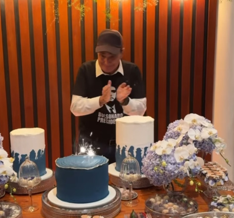 A reação por Nelson Piquet usar camisa de Bolsonaro em aniversário