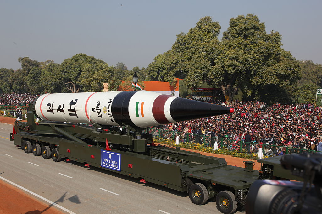 India celebrated its 64 th Republic Day on Jan 26, 2013 marking it with a mighty parade on the Raj Path in New Delhi. Military prowess was show cased, India's 5000 km range Agni-5 ballistic missile, along with main battle tank Arjun, Sukhoi 30 aircrafts and the heavy lift Hercules C-130 aircrafts. The world's only camel mounted band took part. (Photo by Pallava Bagla/Corbis via Getty Images)