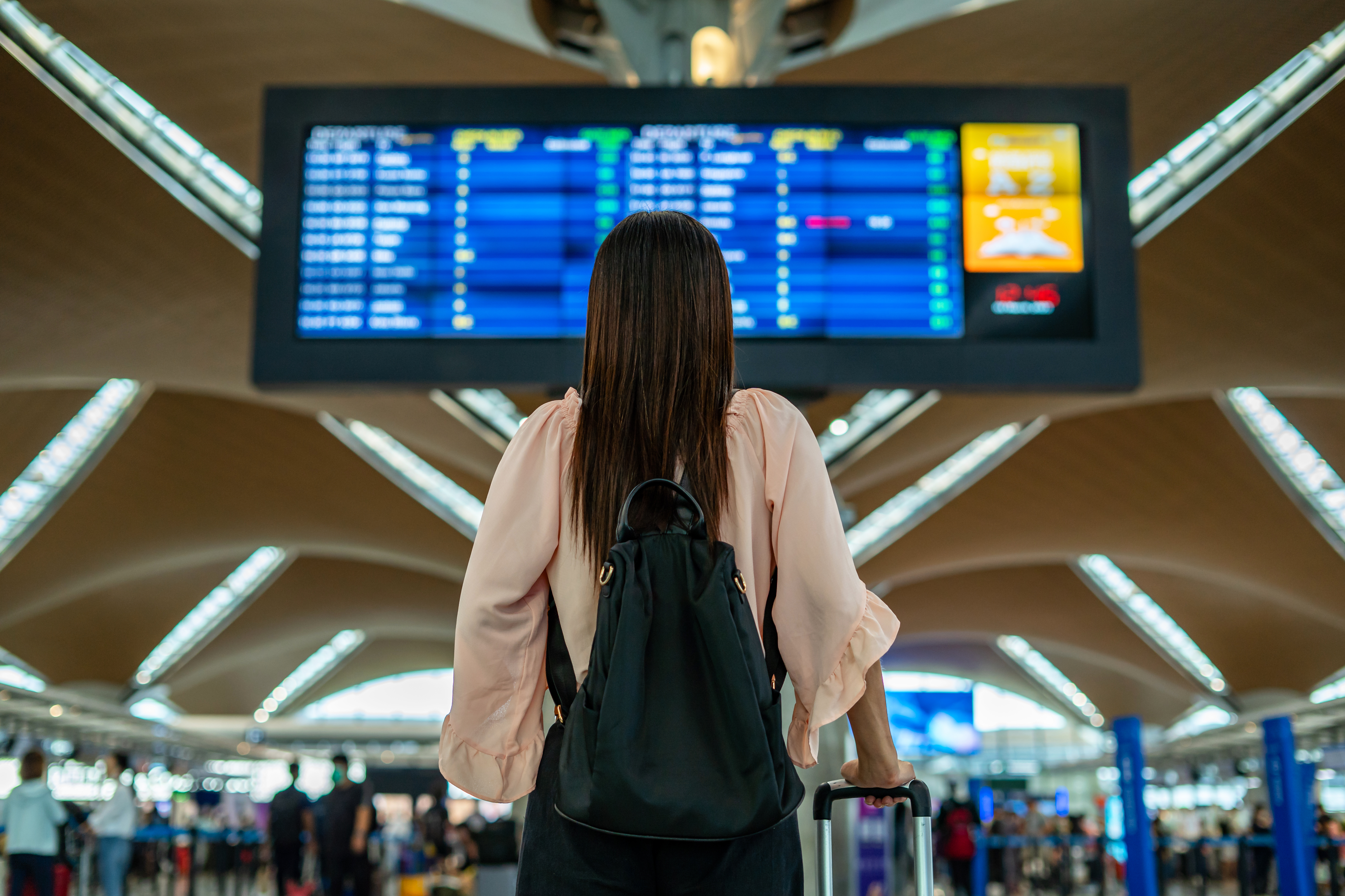 businesswoman standing in airport