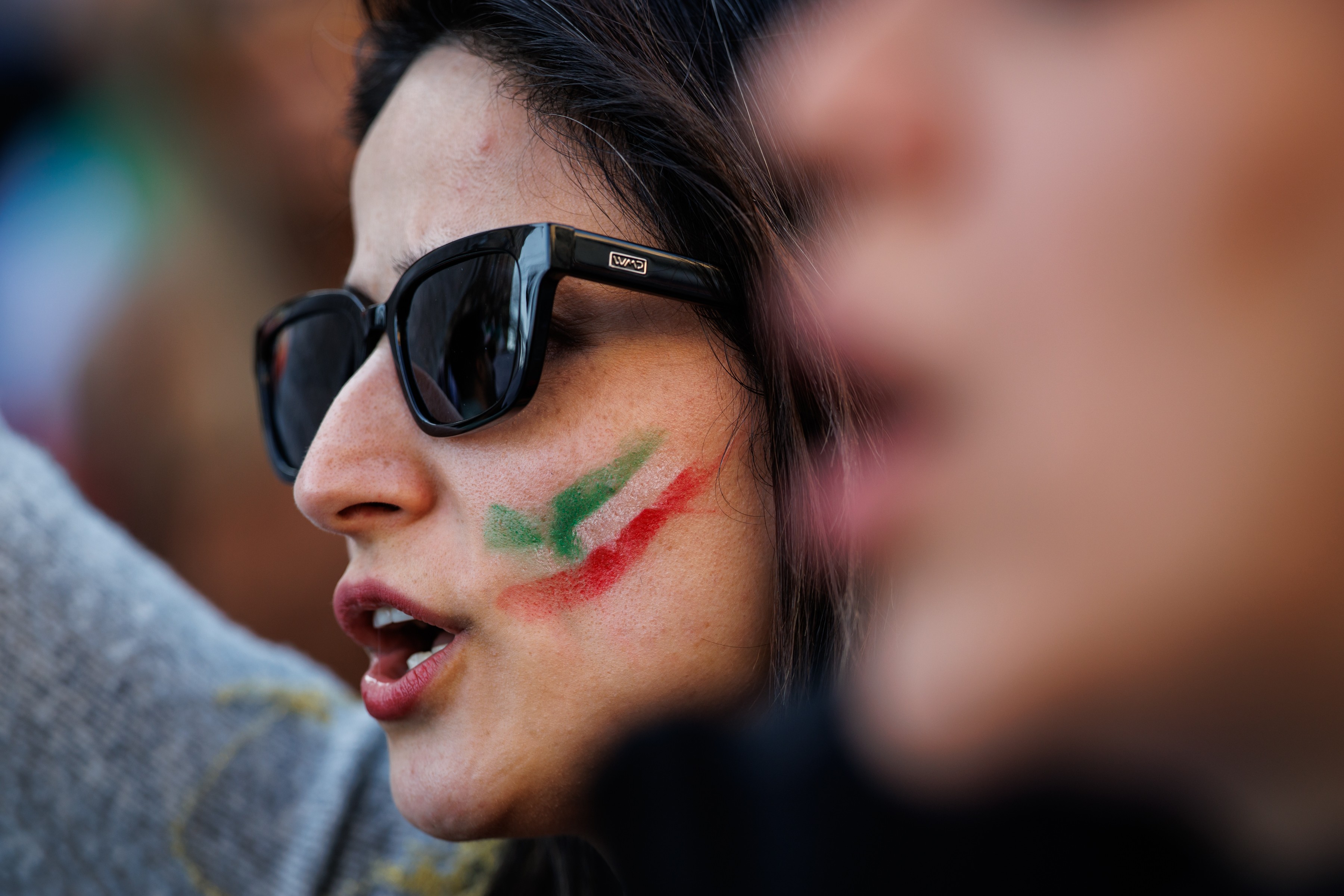 Mulher iraniana em protesto