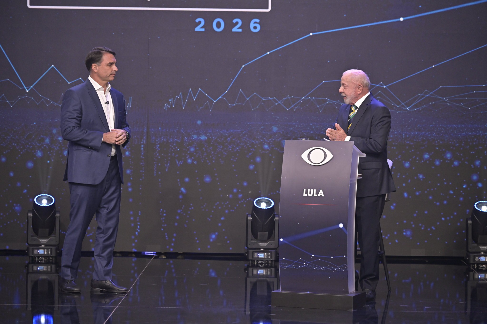 Flávio Bolsonaro e Lula no debate da Band